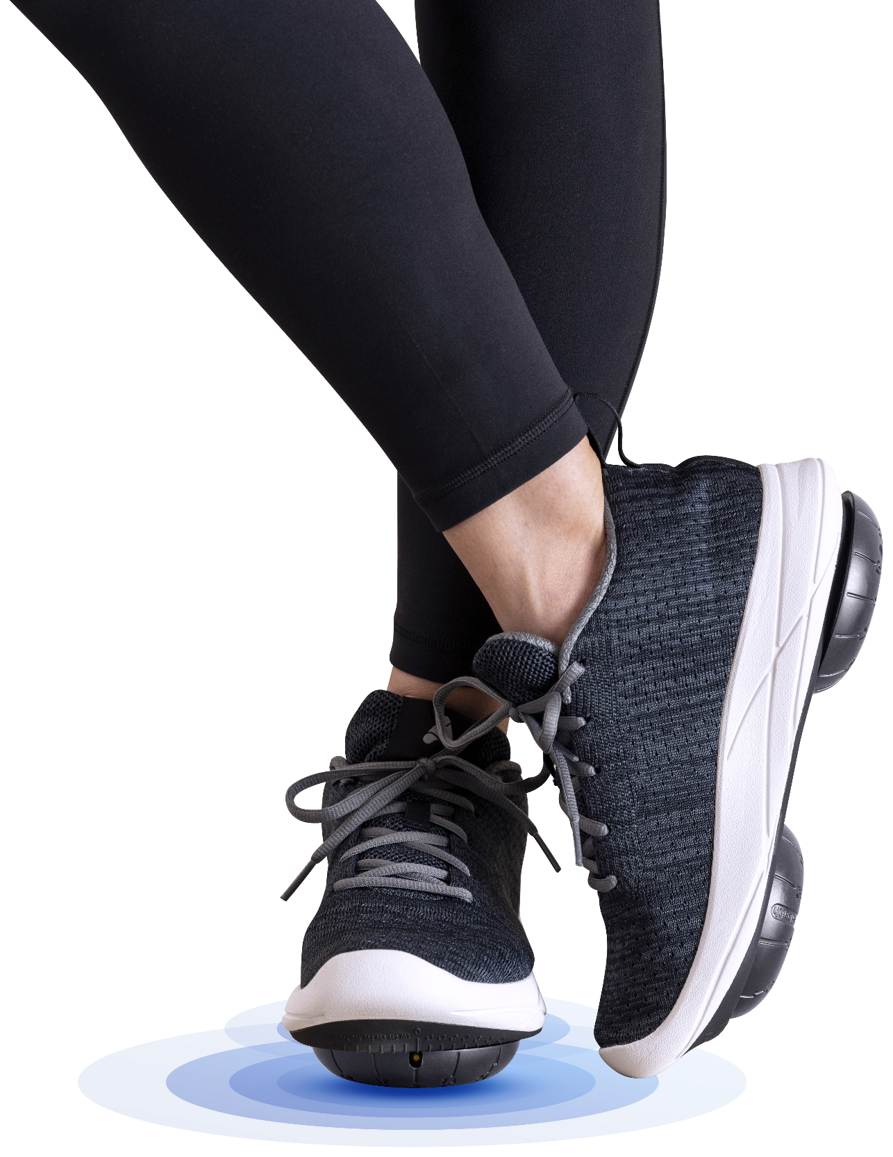 Legs wearing Apos therapeutic footwear with a blue gait sensor glow beneath the sole